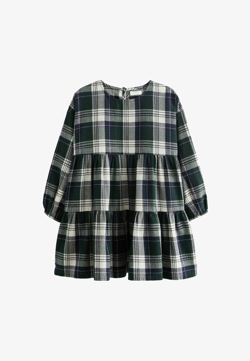 Grön och vit rutmönstrad klänning med långa ärmar, rund halsringning, lagerdesign och knäppning bak. Mjuk bomullstyg.