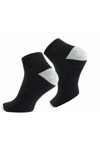 Calzini neri alla caviglia con un bordo a costine, dotati di accenti grigio chiaro sul tallone e sulla punta. Realizzati in un materiale morbido ed elasticizzato.