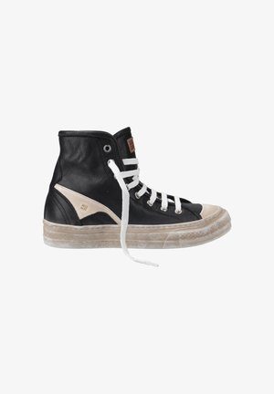 Black high-top sneakers with white laces, leather material, beige accents, round toe, and textured rubber sole. Slightly worn appearance.