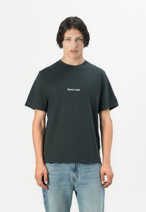 Black short-sleeve t-shirt with a round neckline and embroidered text on the chest, paired with light blue denim jeans.