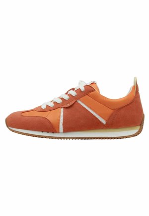 Orange sneaker made of suede and synthetic materials, featuring a layered design, white laces, and a tan rubber sole with a textured pattern.