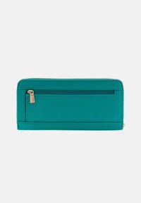 Teal wallet made of textured synthetic material, features a zip-around closure, and an exterior zip pocket; rectangular shape with stitching details.