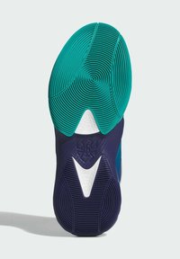 Podeszwa buta z wielokolorowym wzorem w odcieniach teal, granatowym i białym. Żłobiona tekstura z okrągłymi i falistymi wzorami dla lepszej przyczepności.