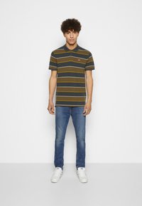 Levi's® 510 SKINNY - Skinny džíny - medium indigo stonewash