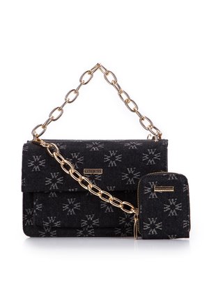 Black fabric handbag with a gold chain strap, featuring a snowflake pattern and a smaller matching wallet attached. Classic rectangular design.