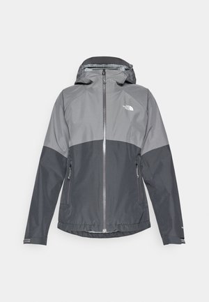 Grå vattentät jacka med huva, har en tvåfärgad design, dragkedja fram och två sidofickor, tillverkad av mjukt, lätt material.