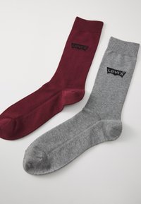 Levi's rot-graue Crew-Socken aus weichem Material, mit gerippten Bündchen und Logo-Akzenten in Schwarz auf beiden Socken.