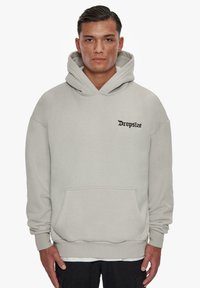Light gray hooded sweatshirt featuring a front pocket and black text "Dropsize" on the left chest. Soft fabric and relaxed fit.