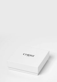 White square gift box with a magnetic closure, featuring the logo 'CHRIST est. 1861' in black lettering on the top.