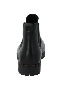 Svarta läderankelboots med elastiska sidopaneler, robusta gummisulor och en liten klack. Har en subtil logodetalj på sidan.