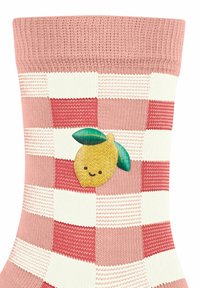 Rosa und weiße karierte Socken mit einem lächelnden Zitronenmotiv und grünen Blättern. Hergestellt aus Strickmaterial mit einem gerippten Bund.
