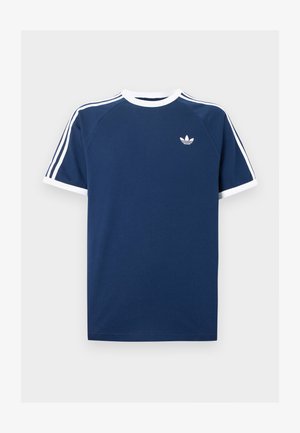 Námornícky modré tričko s bielymi akcentmi, s okrúhlym výstrihom, krátkymi raglánovými rukávmi a malým bielym logom na hrudi. Mäkký bavlnený materiál.