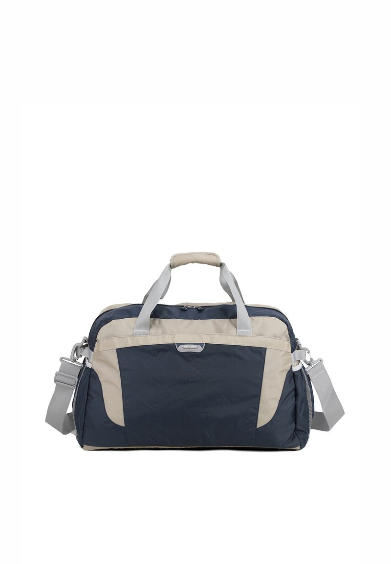 Sac de voyage en toile durable, de couleur marine et beige, doté de doubles poignées supérieures, d'une bandoulière amovible et d'une poche zippée à l'avant.