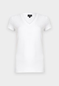 Λευκό t-shirt με V λαιμόκοψη κατασκευασμένο από βαμβάκι με κοντά μανίκια, με μικρή λεπτομέρεια λογότυπου στο αριστερό στήθος. Ομαλή υφή υφάσματος.