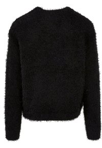 Pull noir à manches longues en tissu duveteux avec col rond et texture douce.