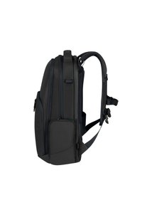 Zaino nero con spallacci imbottiti e regolabili, più scomparti con zip e un esterno testurizzato. Design compatto e slanciato adatto per l'uso quotidiano.