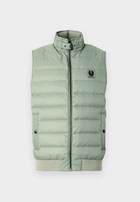 Polstret lysegrøn ærmeløs vest med høj krave, lynlås foran, sidelommer og logo-patch på brystet. Tekstureret stof.