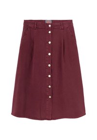 Jupe évasée bordeaux en coton. Elle présente un devant à boutons, deux poches latérales et un ourlet qui se courbe doucement vers le haut sur les côtés.