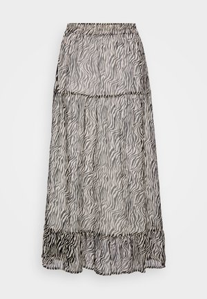 Jupe longue et transparente avec un motif rayé zèbre en noir et gris. Ceinture élastique avec un ourlet volanté en bas. Tissu léger.