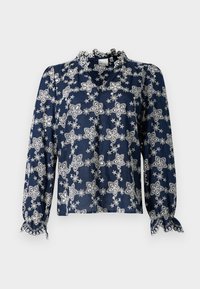 Blusa blu navy con motivo floreale bianco, colletto a balze e maniche lunghe con polsini elasticizzati. Tessuto leggero, con eleganti dettagli in pizzo.