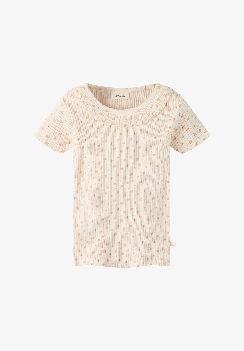 Haut à manches courtes côtelé beige clair avec petit motif de points marron et encolure ronde à volants, conçu pour les enfants.