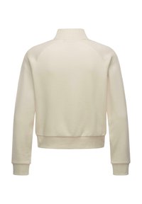 Sweter z okrągłym dekoltem w jasnym beżu, wykonany z miękkiego materiału. Posiada ściągacze przy mankietach i u dołu, z prostym, minimalistycznym wzorem z tyłu.
