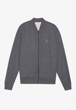 Grå zip-up sweatshirt lavet af blødt stof, med ståkrave, ribbede manchetter og et lille guldlogo på brystet.
