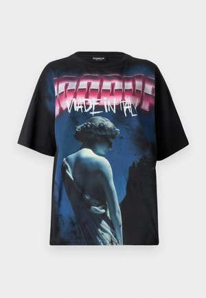 Black oversized t-shirt featuring a graphic print of a statue in blue tones and bold "MADE IN ITALY" text in pink and white.