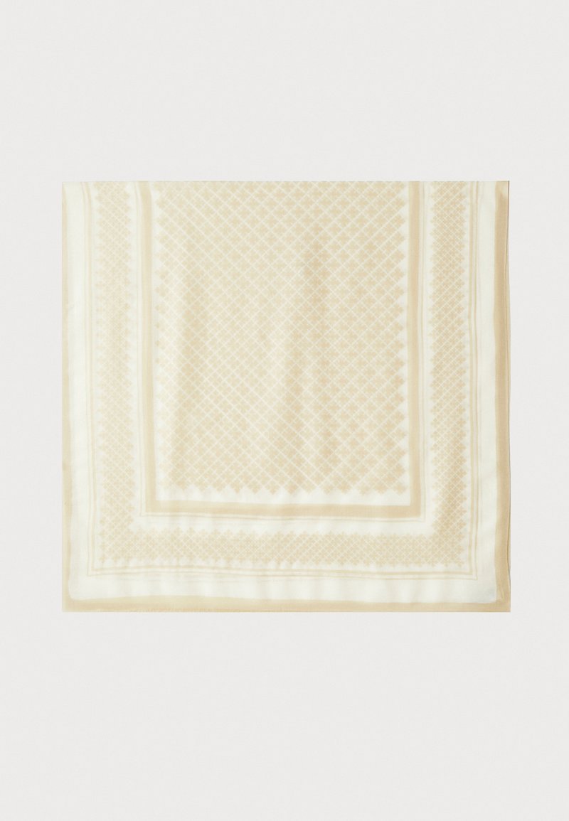 Foulard en soie de couleur beige clair avec un motif en diamant et une texture lisse. Bordures soulignées d'un beige légèrement plus foncé pour le contraste.