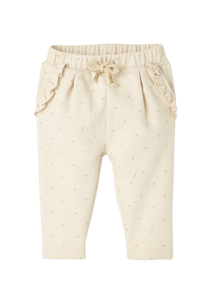 Cremefarbene Babyhosen mit strukturierter Oberfläche, die kleine Herzmuster, Rüschen an den Seiten und eine dekorative Schleife an der Taille aufweisen.