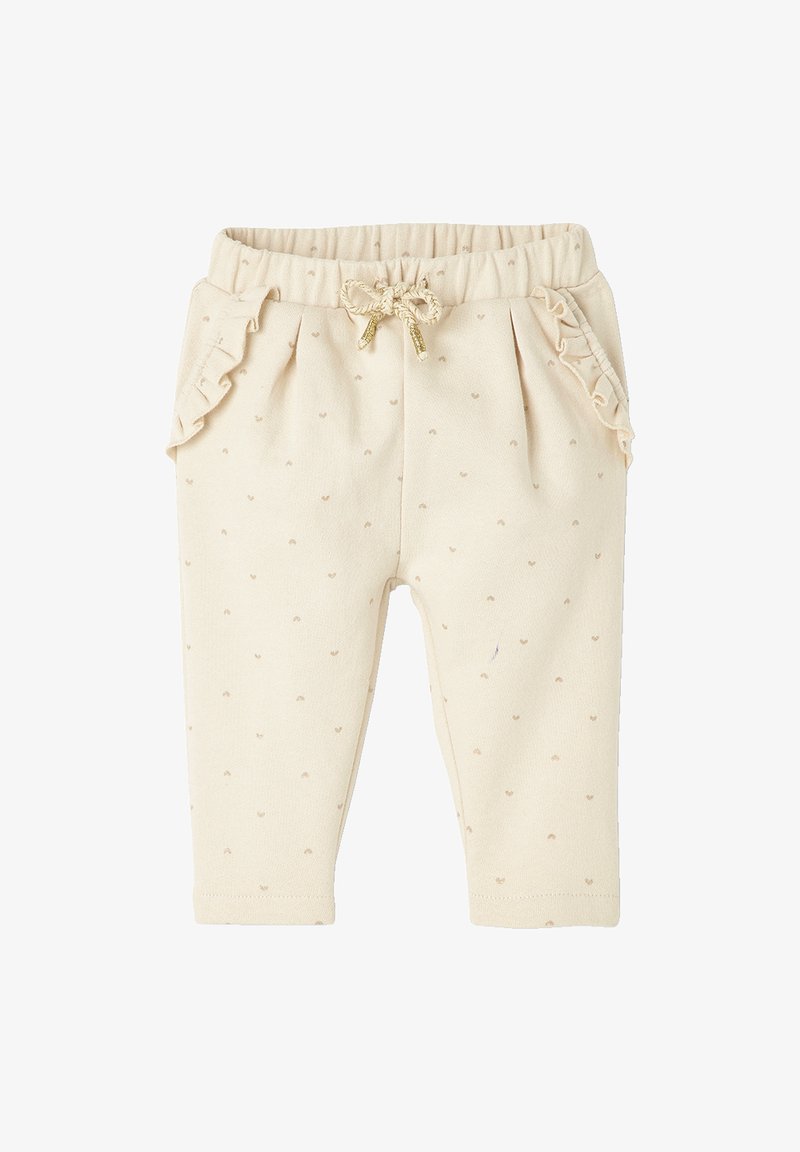 Cremefarbene Babyhosen mit strukturierter Oberfläche, die kleine Herzmuster, Rüschen an den Seiten und eine dekorative Schleife an der Taille aufweisen.
