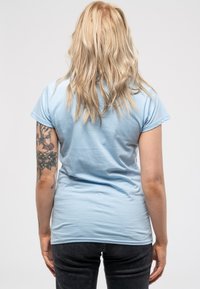 Paradiso Clothing DECCA LOGO - Print T-shirt - blue