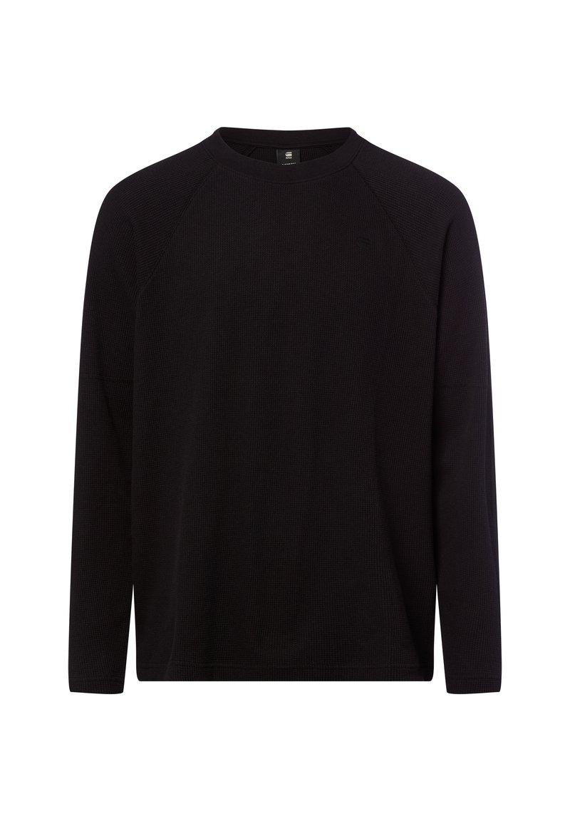 Schwarzer langärmliger Pullover aus strukturiertem Rippenstoff mit Rundhalsausschnitt und Raglanärmeln. Verfügt über ein dezentes Logo auf der Brust.