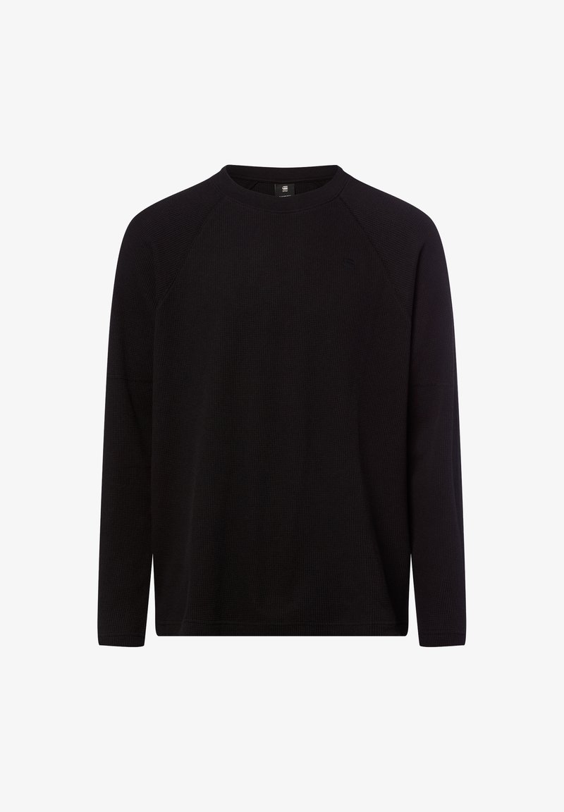 Schwarzer langärmliger Pullover aus strukturiertem Rippenstoff mit Rundhalsausschnitt und Raglanärmeln. Verfügt über ein dezentes Logo auf der Brust.