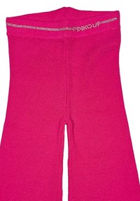 Pantaloni a coste di colore rosa intenso con gamba svasata e logo in strass "PINKO UP" sulla vita.