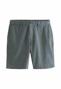 Shorts verts en tissu texturé, dotés de deux poches avant, d'une fermeture à bouton et d'une coupe droite avec un motif subtil.