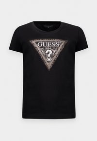 T-shirt corto a maniche corte nero con un grande logo a triangolo scintillante che presenta "GUESS U.S.A." e un punto interrogativo centrale.
