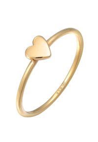 Goldener Metallring mit einer glatten herzförmigen Oberseite und einem schlanken Band. Einfaches Design mit polierter Oberfläche. Größe und Metallqualität sind innen gekennzeichnet.