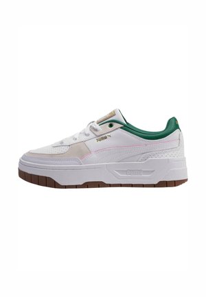White sneaker with green accents, featuring a mix of leather and textile materials, textured sole, perforated details, and branding on the side.