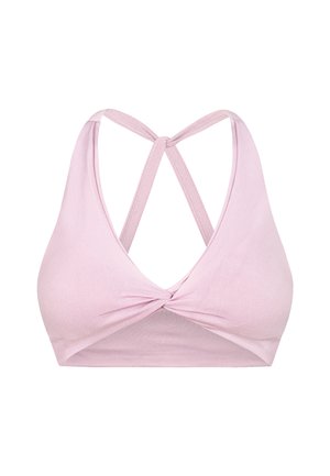 Roze naadloze bralette met een diepe halslijn, gedraaide voorkant en gekruiste rugbandjes. Glad textuur en gemiddelde dekking.