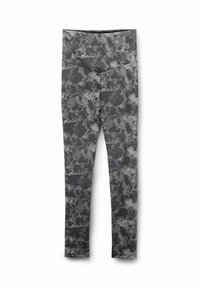 Legginsy w ciemnoszarym kolorze z teksturowanym, abstrakcyjnym wzorem. Wysoka talia i dopasowany krój nadają sylwetce smukły wygląd.