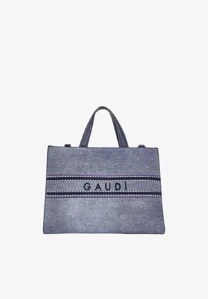 Borsa rettangolare blu con texture, doppio manico e scritta "GAUDI" tra due bande orizzontali a righe.