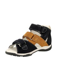 Sandali in suede con tre cinturini regolabili in blu scuro e color tan, caratterizzati da cuciture bianche e una suola in gomma supportante per una buona aderenza.