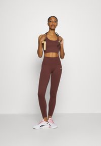 ICANIWILL DEFINE SEAMLESS POCKET - Tights - warm brown