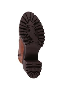 Stivale in pelle marrone con suola in gomma resistente, dotato di logo di un cavallo e un motivo a trama testurizzata per una migliore trazione.