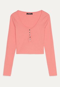 Pink ribbed long-sleeve cropped top with a scoop neckline and five silver button accents along the front. Soft texture.