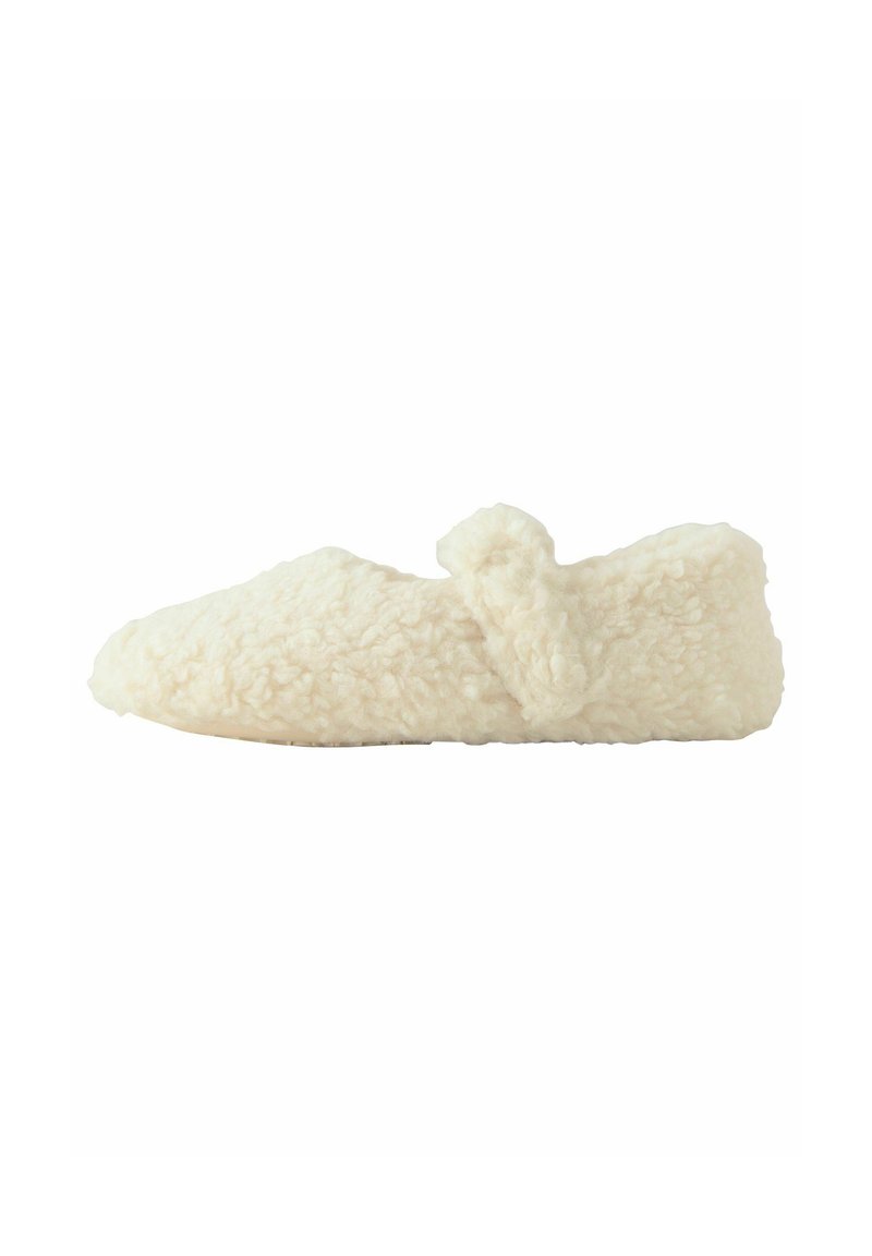 Krämfärgad Toffel tillverkad av mjukt, fluffigt material. Har en rundad tå och en dekorativ knutdetalj på ovansidan.