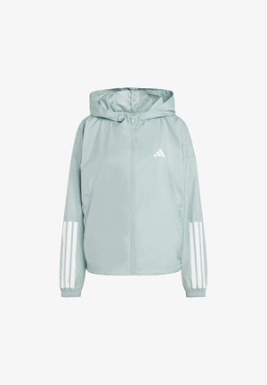 Vaaleanvihreä vetoketjullinen takki, jossa on huppu, ja olkapäillä valkoiset kolmiopaisteraitat sekä pieni valkoinen logo rinnassa. Sileä pinta.