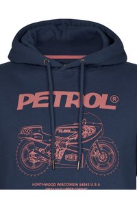 Sudadera con capucha de color azul marino hecha de algodón. Presenta un gran gráfico rosa de una motocicleta y el texto "PETROL" en la parte delantera, con cordones.