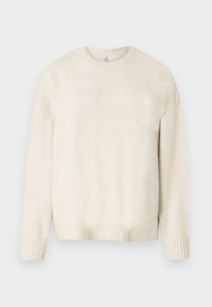 Lichtbeige trui van zachte stof, met een ronde halslijn, lange mouwen en geribbelde manchetten en onderkant. Eenvoudig, klassiek ontwerp.